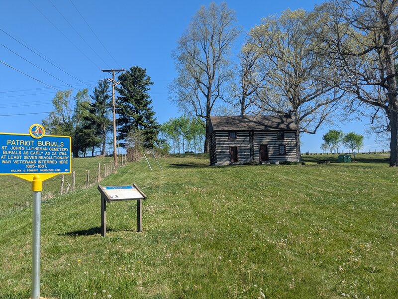 Patriot Burials historical marker and the Flohr House at St. John's