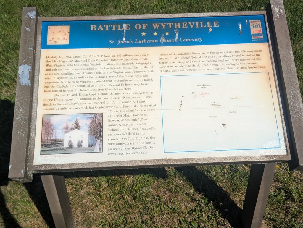 Civil War Trails interpretive panel titled BATTLE OF WYTHEVILLE describing the July 18, 1863 Union raid led by Col. John T. Toland and the Federal dead buried at St. John's Lutheran Cemetery