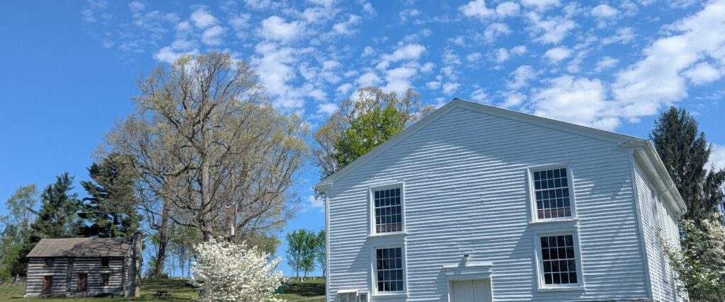 Old St. John Lutheran Church and cemetery with dogwood in bloom